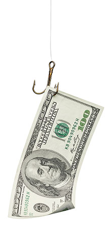 photo of a $100 bill on a fishing hook photo of a $100 bill on a fishing hook